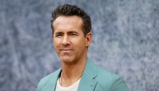 How does Ryan Reynolds use humor in his career?